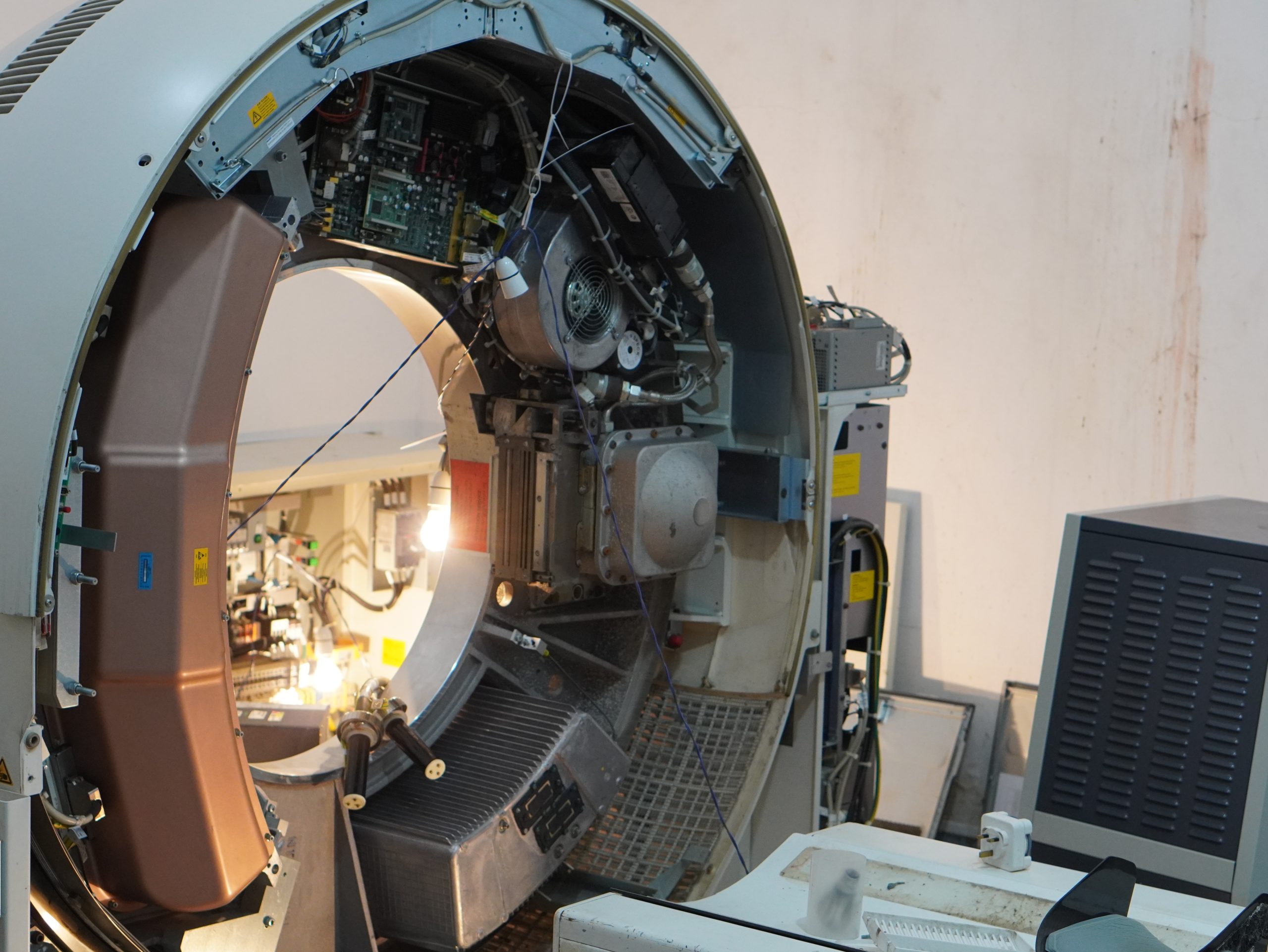 CT Scan Machine of the Chilaw Base Hospital with its outer cover removed in an attempt to dry the electrical components and fix it. This machine is worth Approximately 250 million Rupees. There is only one CT scan common for Chilaw DGH and for its nearby base hospitals like marawila etc.