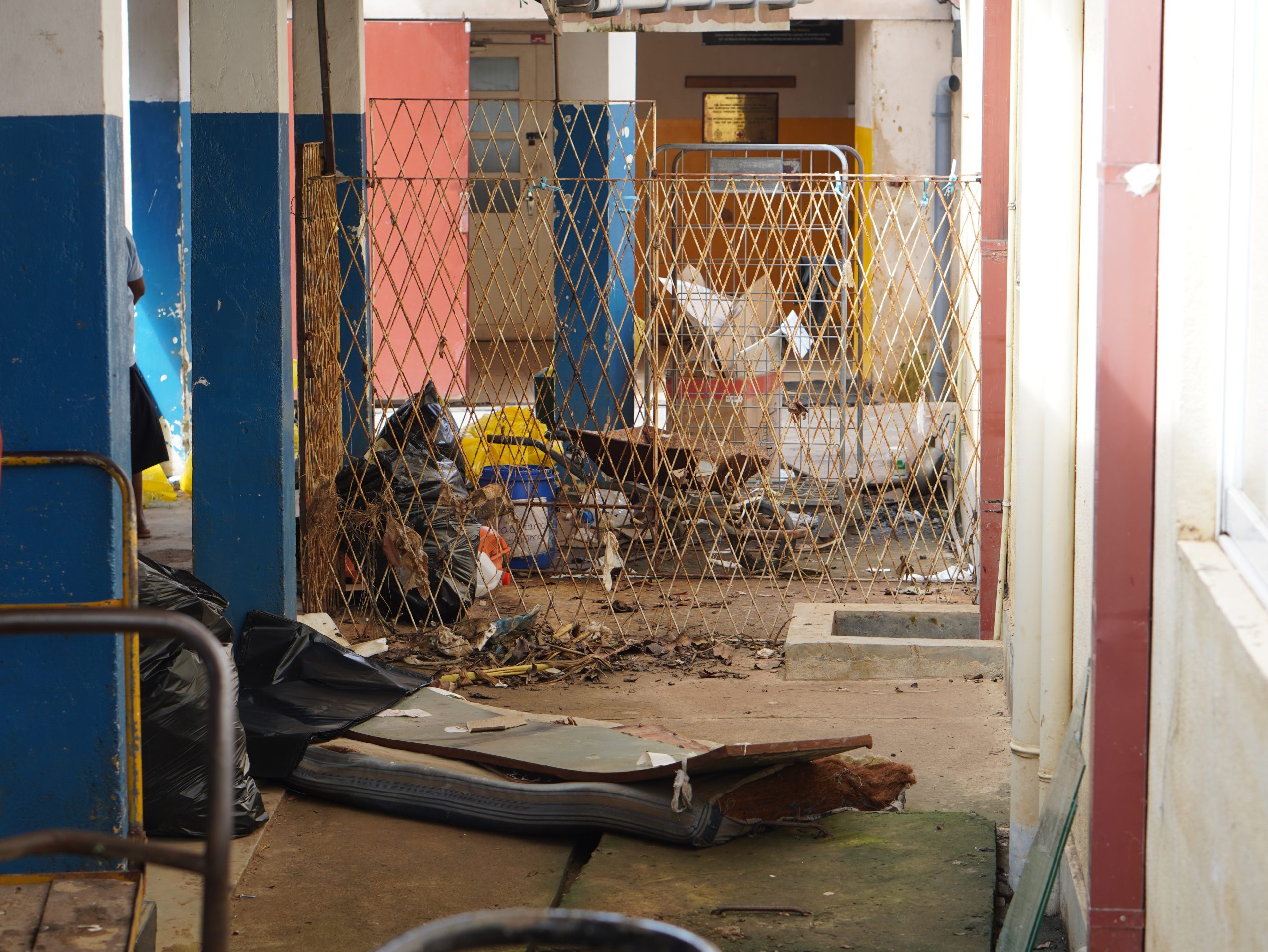 Residual Garbage from the floods trapped in fences Chilaw District General Hospital.