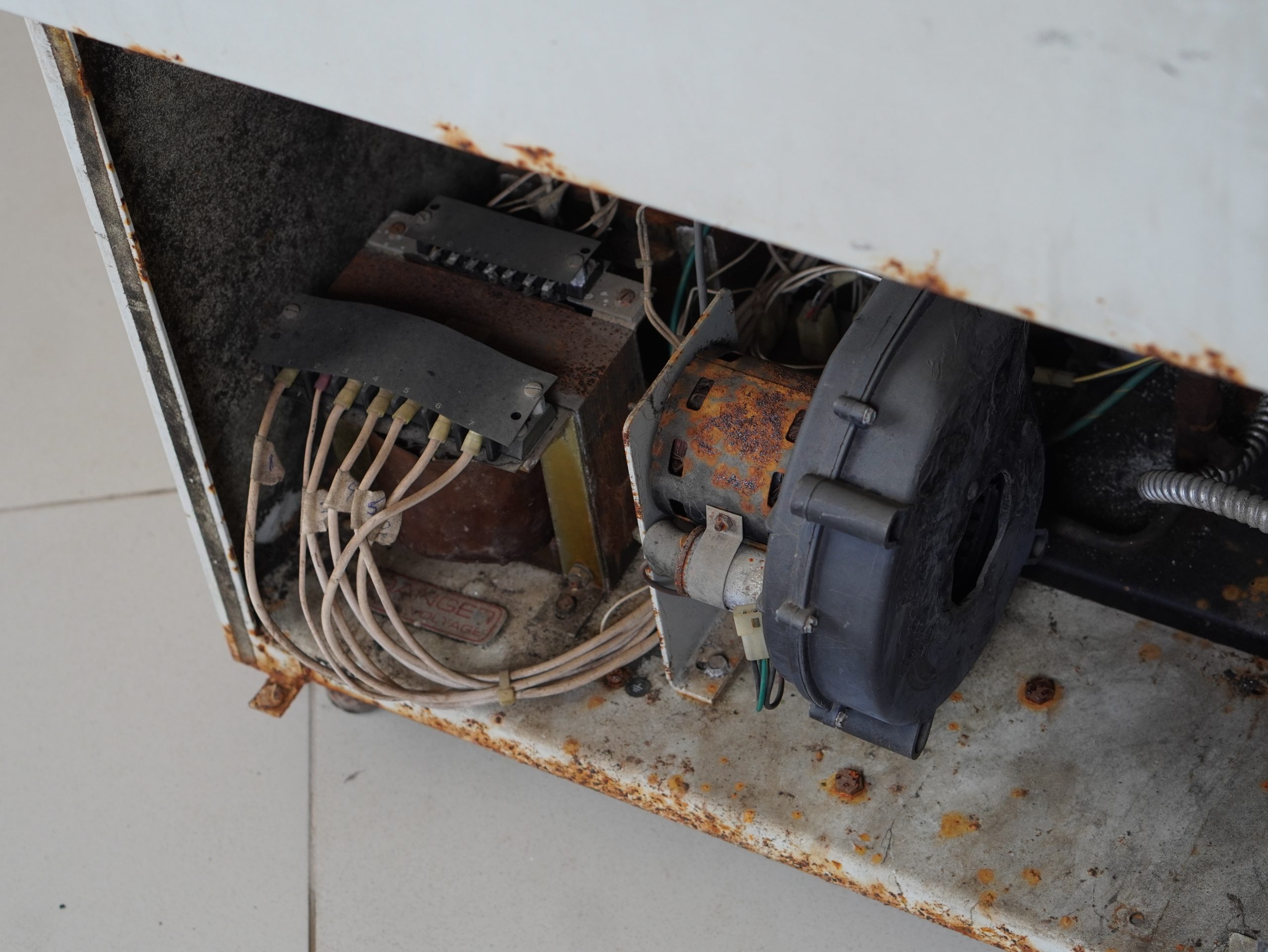 Centrifuge machine in the Chilaw Blood bank damaged and electricals covered with mud and rust.